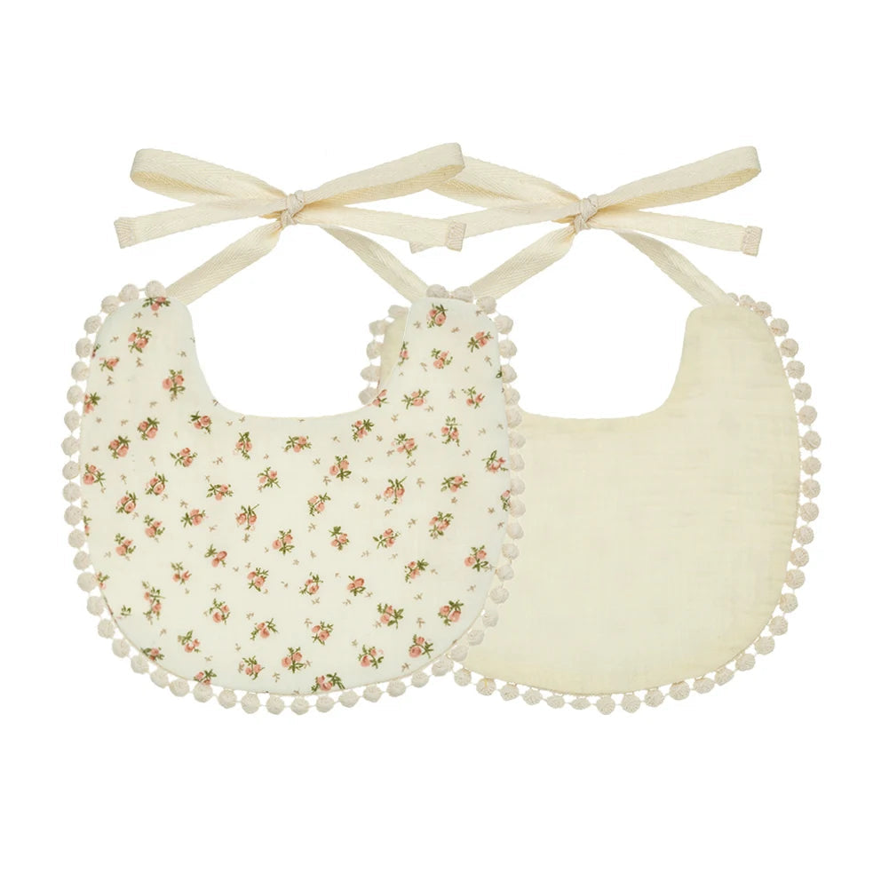 Bavoir en coton brodé double-face