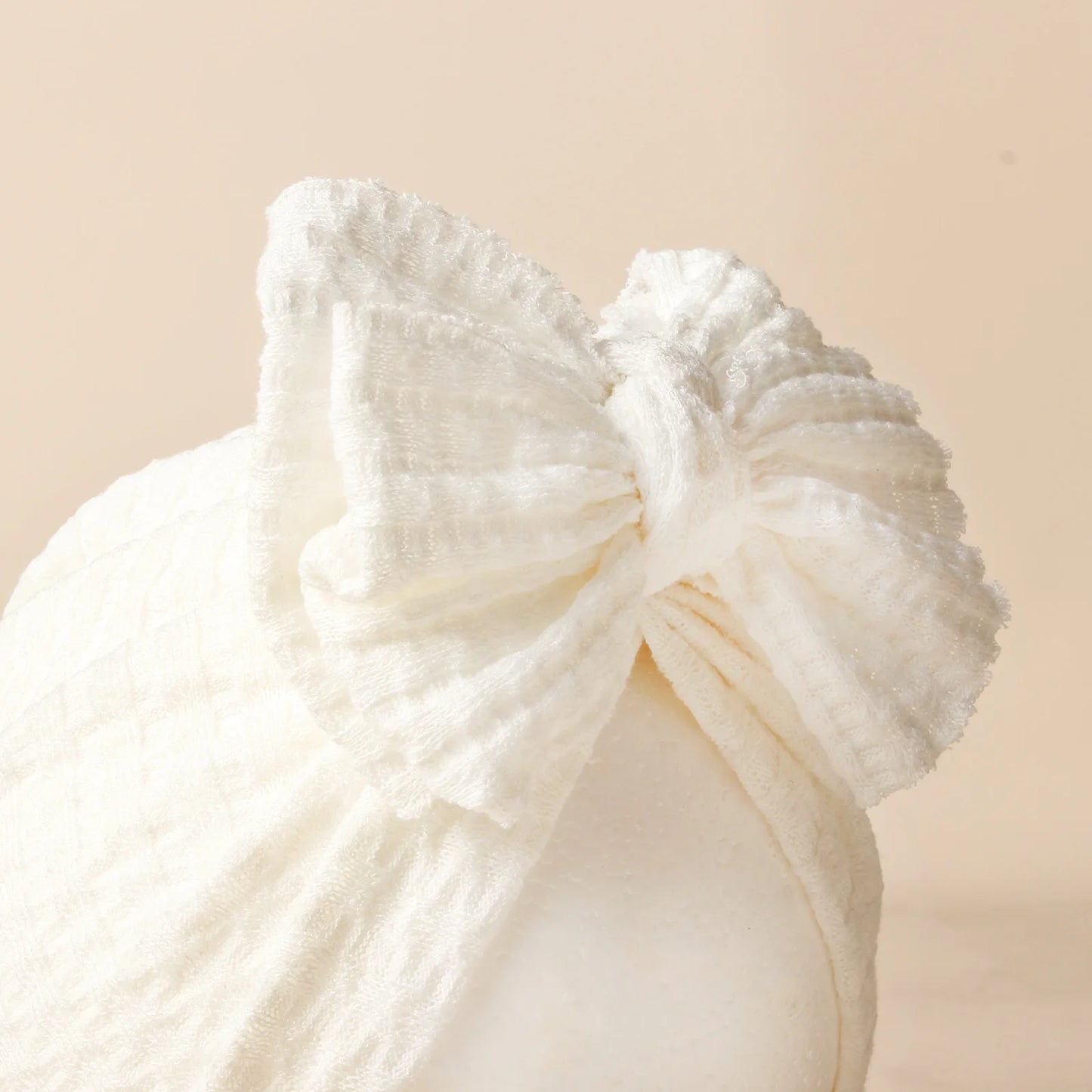 Turban en tricot avec noeud pour bébé