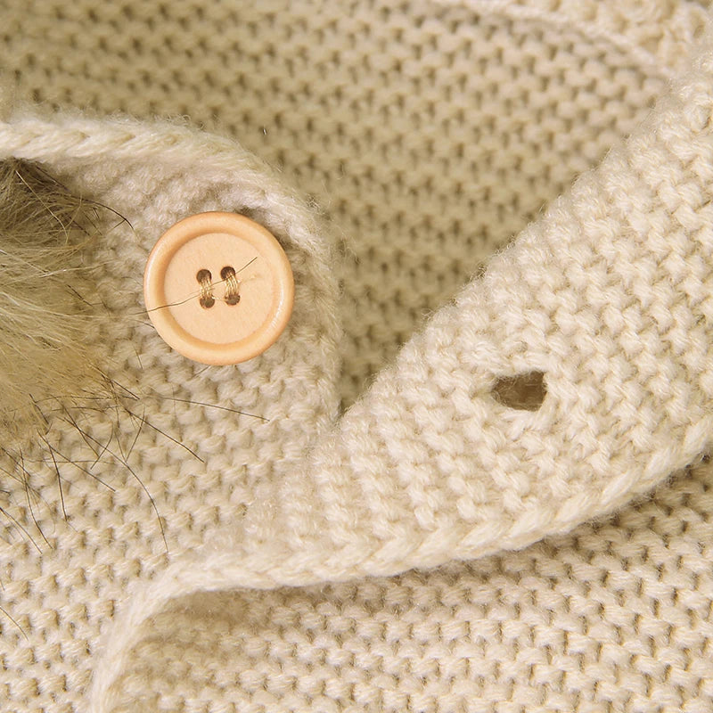 Combinaison tricotée à capuche pour bébé