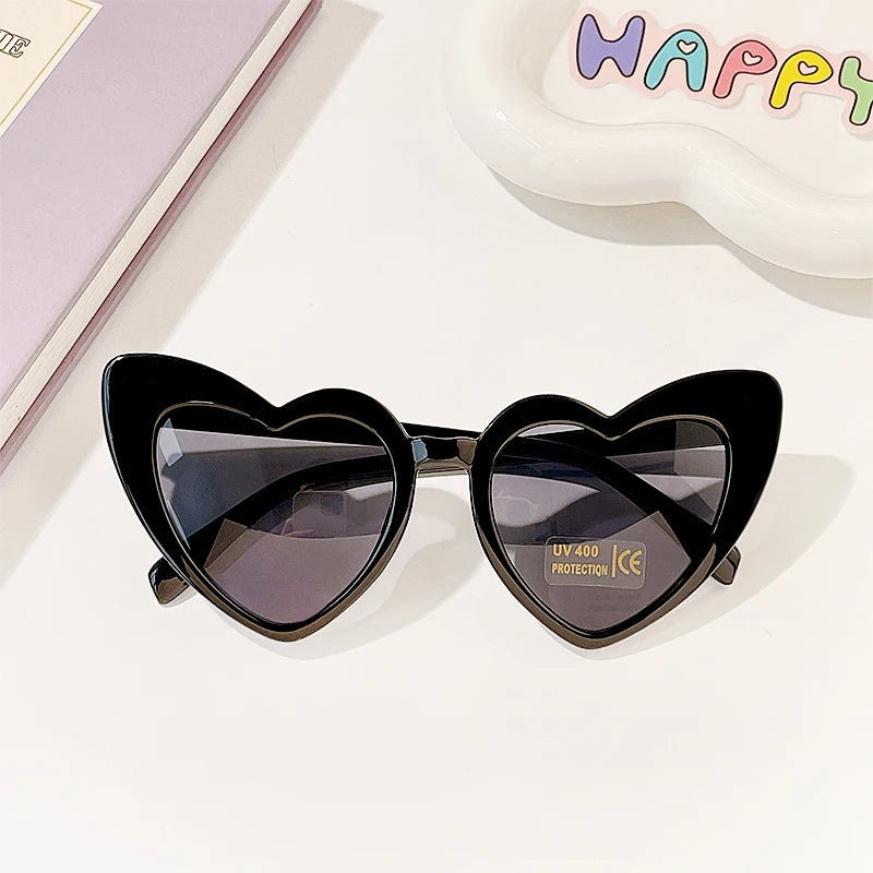 Lunette colorée avec un design en forme de coeur pour enfant