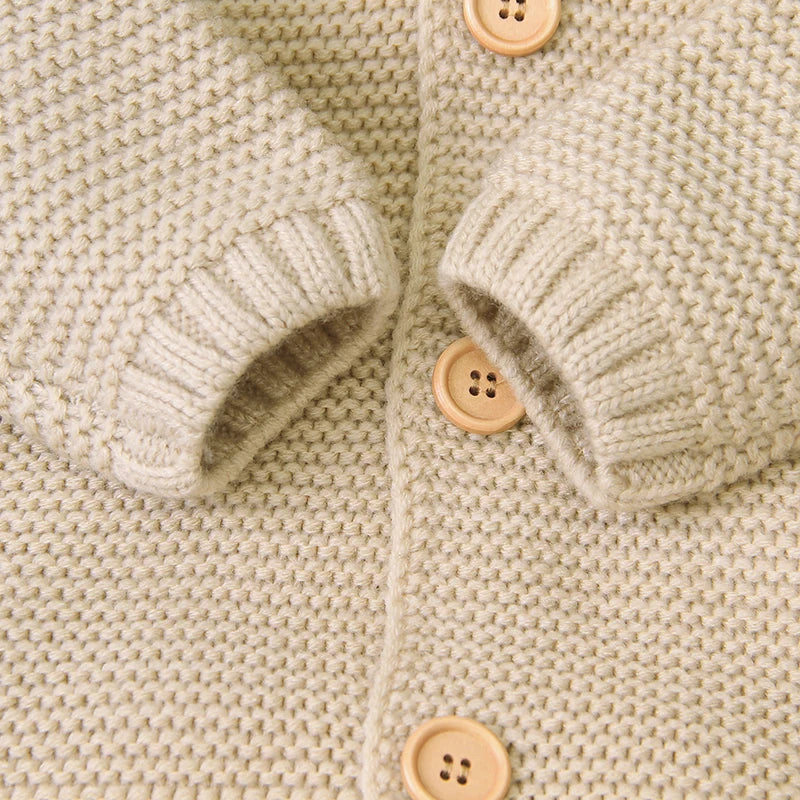 Combinaison tricotée à capuche pour bébé