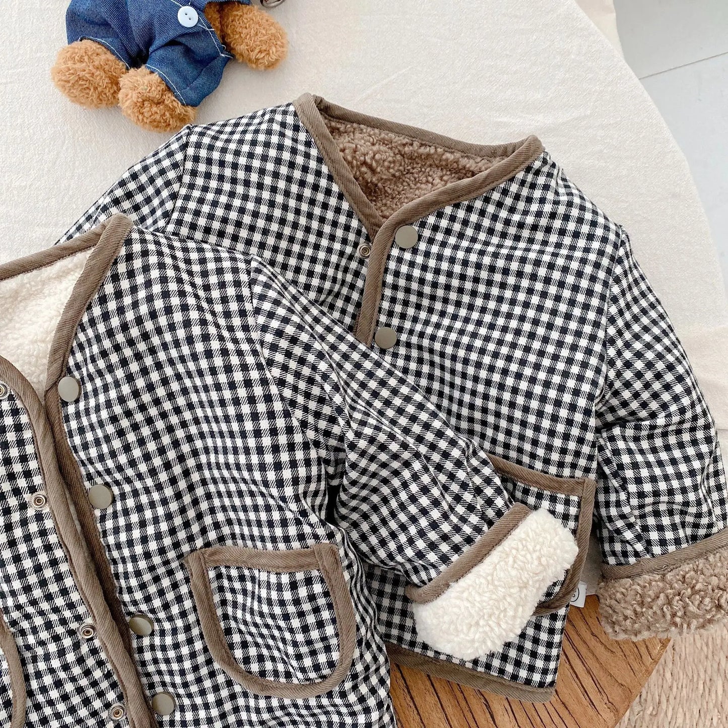 Veste plaid double face pour bébé