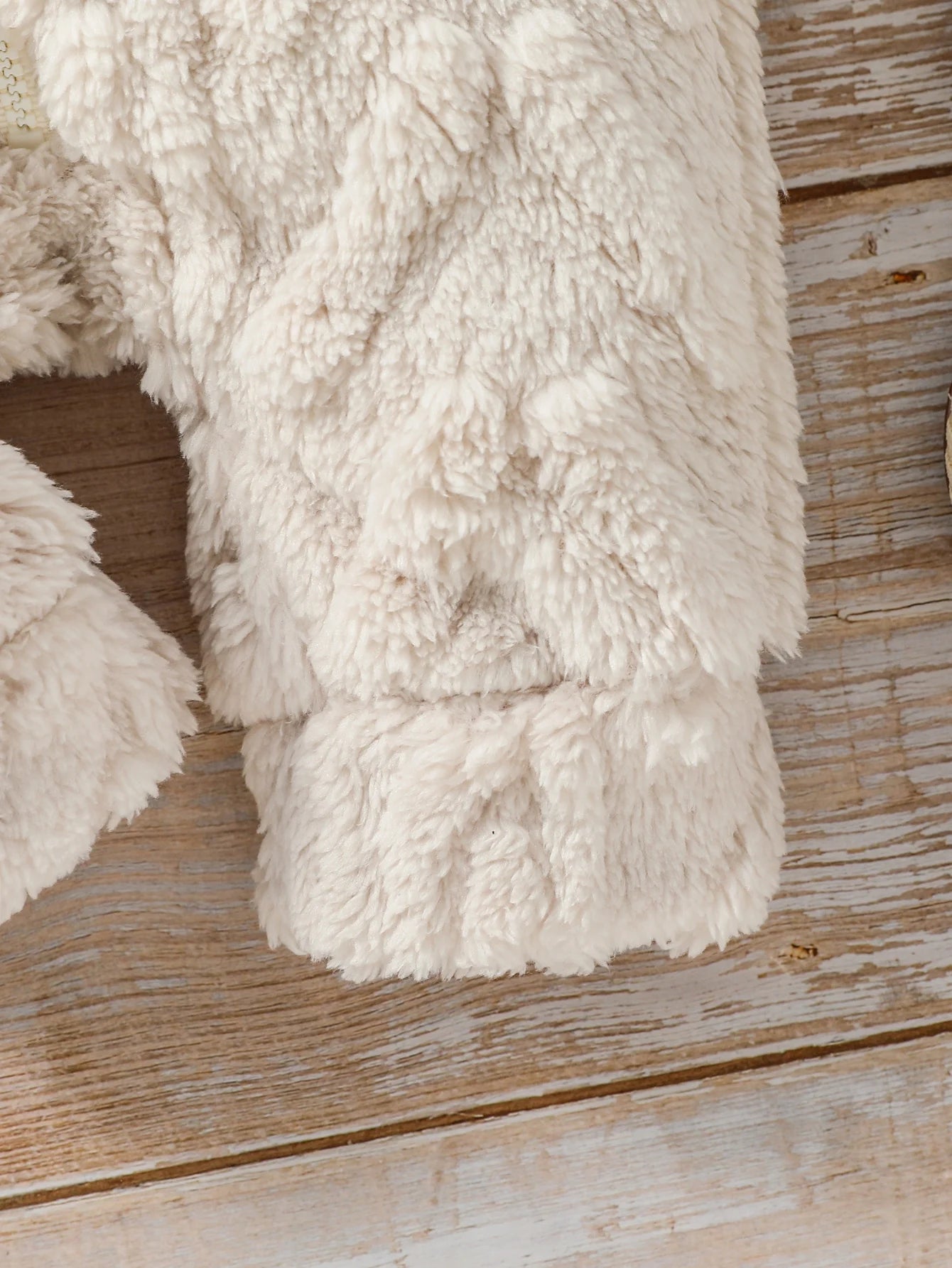 Combinaison en peluche à capuche pour nouveau-né