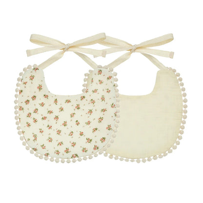 Bavoir en coton brodé double-face