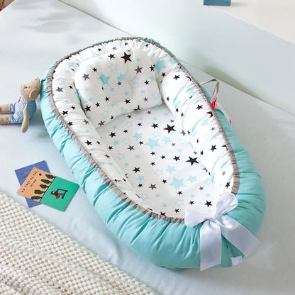 Couffin réducteur de lit avec étoiles pour bébé