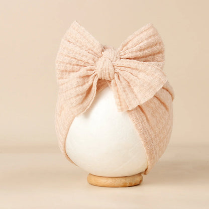 Turban en tricot avec noeud pour bébé