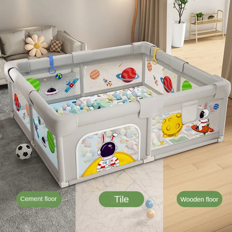 Parc de jeux pour bébé avec décor planètes
