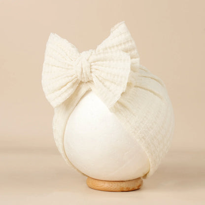 Turban en tricot avec noeud pour bébé