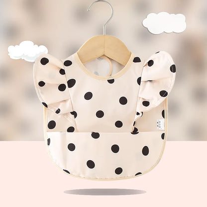 Bavoir imperméable avec ailes d’ange pour bébé