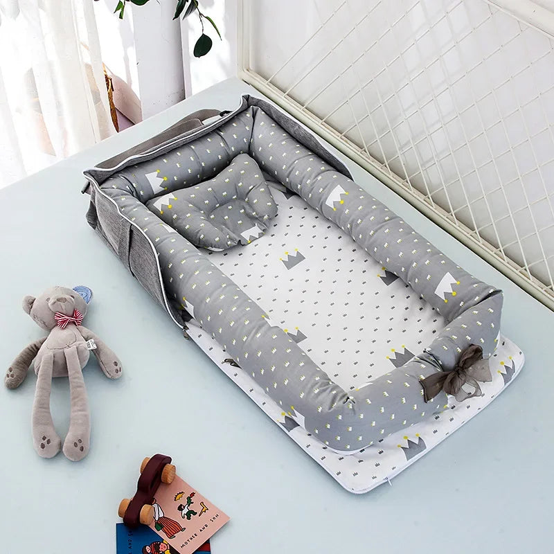 Réducteur de lit bébé pliable gris