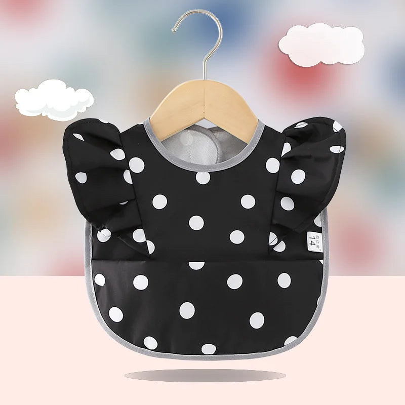 Bavoir imperméable avec ailes d’ange pour bébé