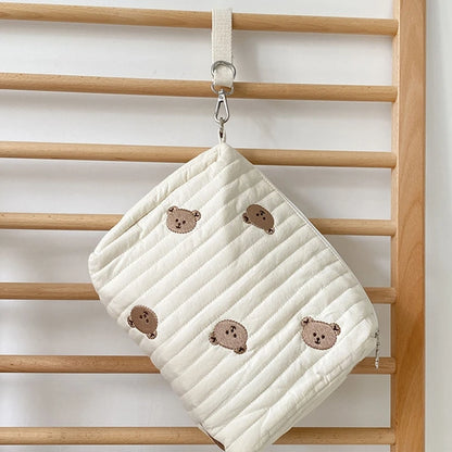 Sac à langer brodé et matelassé petit modèle pour bébé