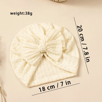 Turban en tricot avec noeud pour bébé