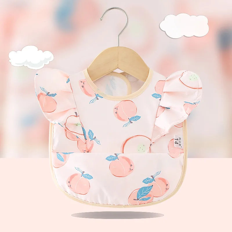 Bavoir imperméable avec ailes d’ange pour bébé