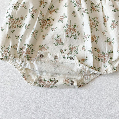 Ensemble barboteuse à manches longues et chapeau fleuri pour bébé