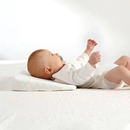 Coussin cale pour nouveau-né