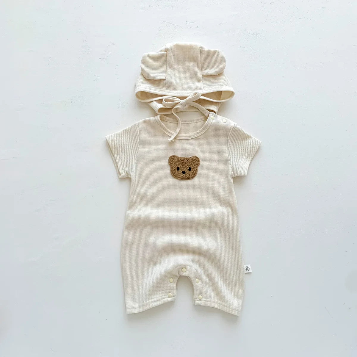 Barboteuse avec bonnet pour bébé