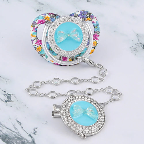 Sucette de luxe à motif papillon pour bébé