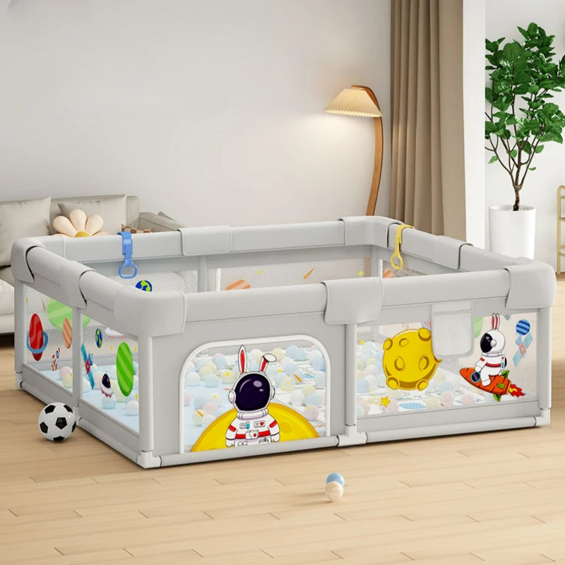 Parc de jeux pour bébé avec décor planètes