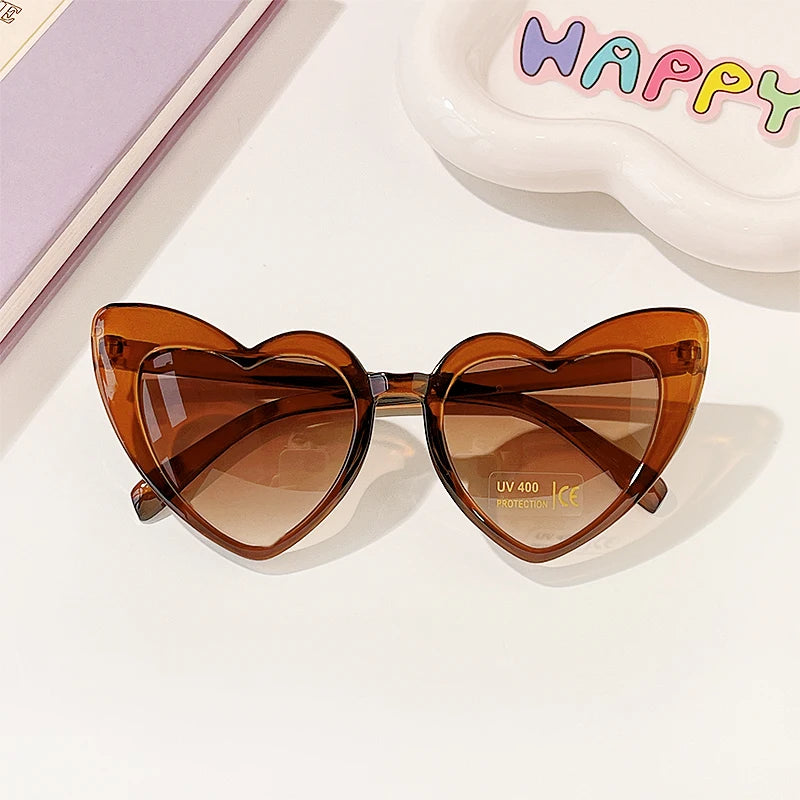 Lunette colorée avec un design en forme de coeur pour enfant