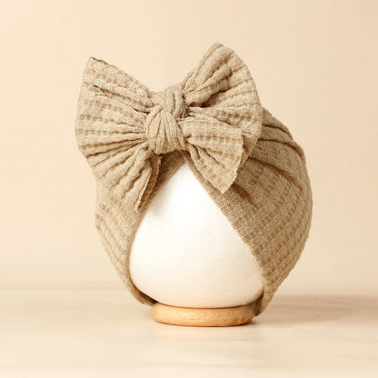 Turban en tricot avec noeud pour bébé