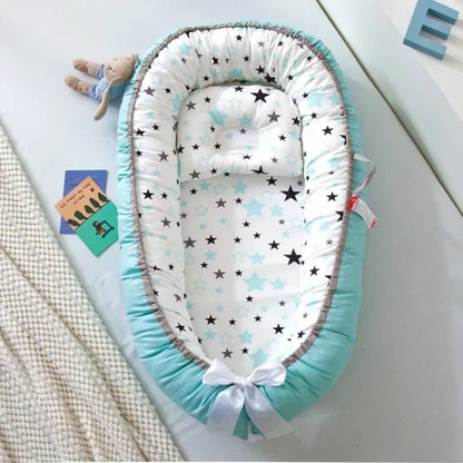 Couffin réducteur de lit avec étoiles pour bébé