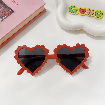 Lunette colorée avec un design en forme de coeur pour enfant