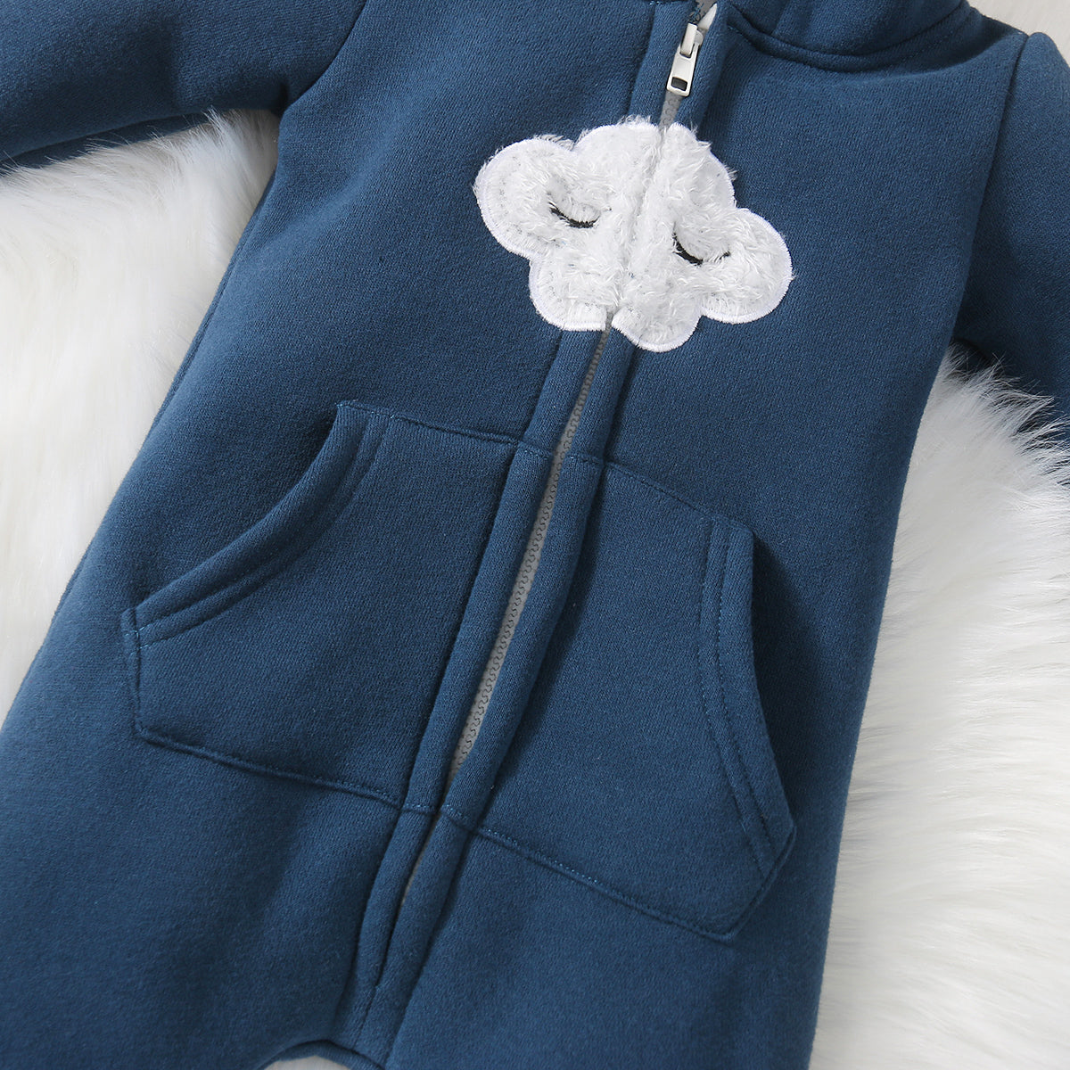 Grenouillère à capuche pour bébé