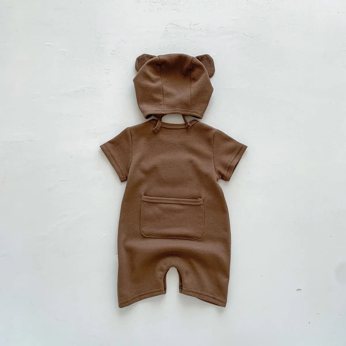 Barboteuse avec bonnet pour bébé