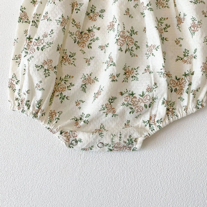 Ensemble barboteuse à manches longues et chapeau fleuri pour bébé