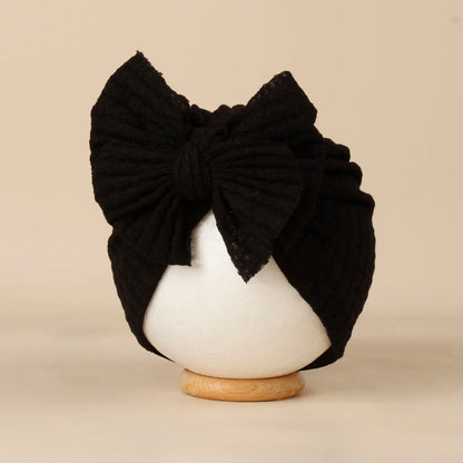 Turban en tricot avec noeud pour bébé
