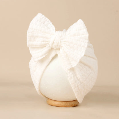 Turban en tricot avec noeud pour bébé
