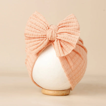 Turban en tricot avec noeud pour bébé