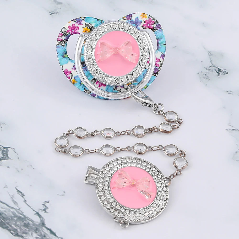 Sucette de luxe à motif papillon pour bébé