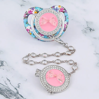 Sucette de luxe à motif papillon pour bébé