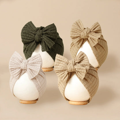 Turban en tricot avec noeud pour bébé