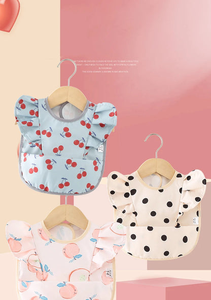 Bavoir imperméable avec ailes d’ange pour bébé