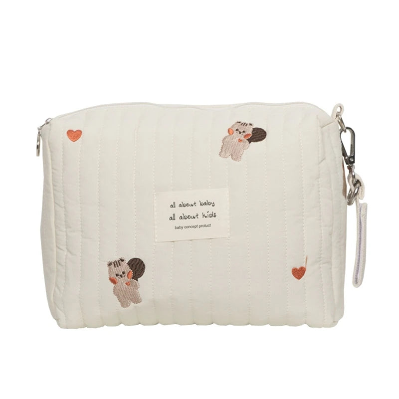 Sac à langer brodé et matelassé petit modèle pour bébé