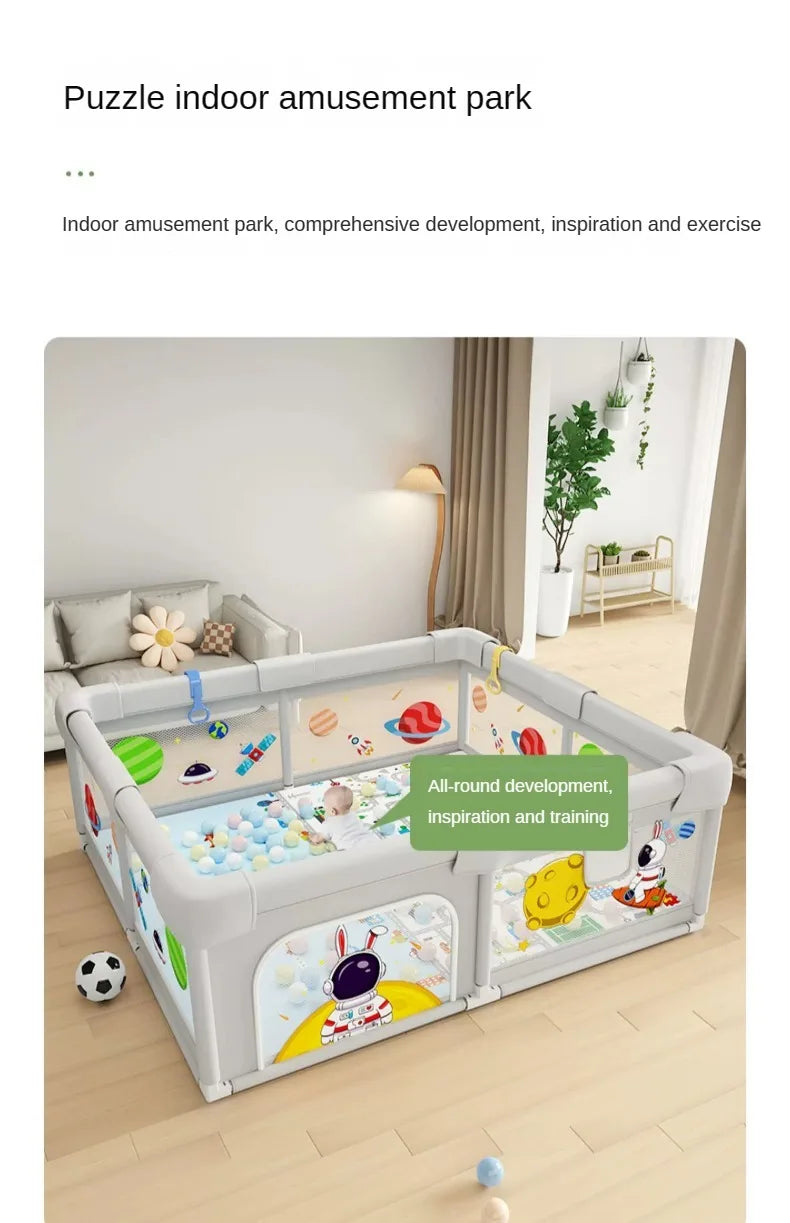 Parc de jeux pour bébé avec décor planètes