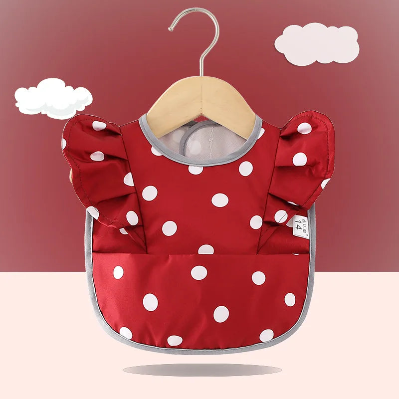 Bavoir imperméable avec ailes d’ange pour bébé