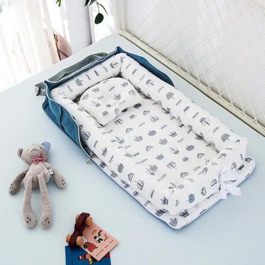 Réducteur de lit bébé pliable bleu