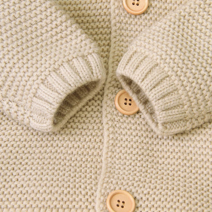 Combinaison tricotée à capuche pour bébé